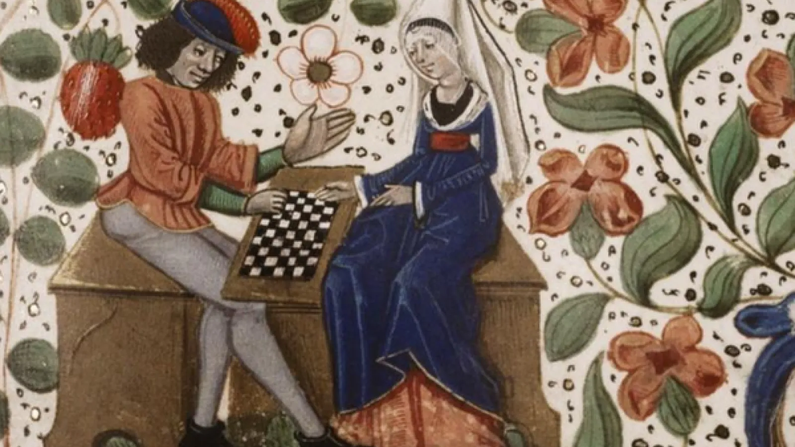 A man and a woman play chess while sitting on a bench and surrounded by flower wallpaper