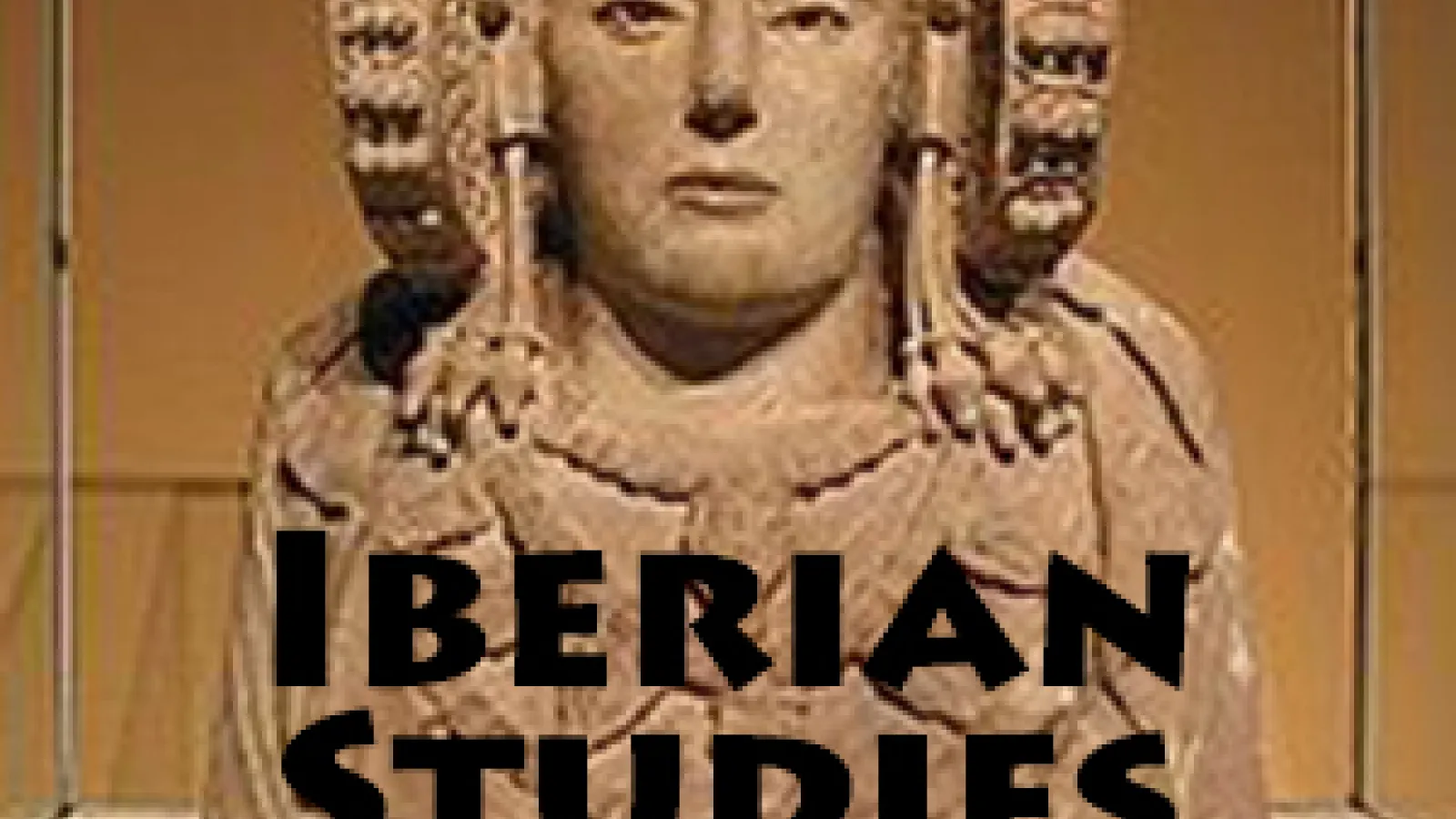 stone carving of a sphynx figure text reads ibertan studies working group
