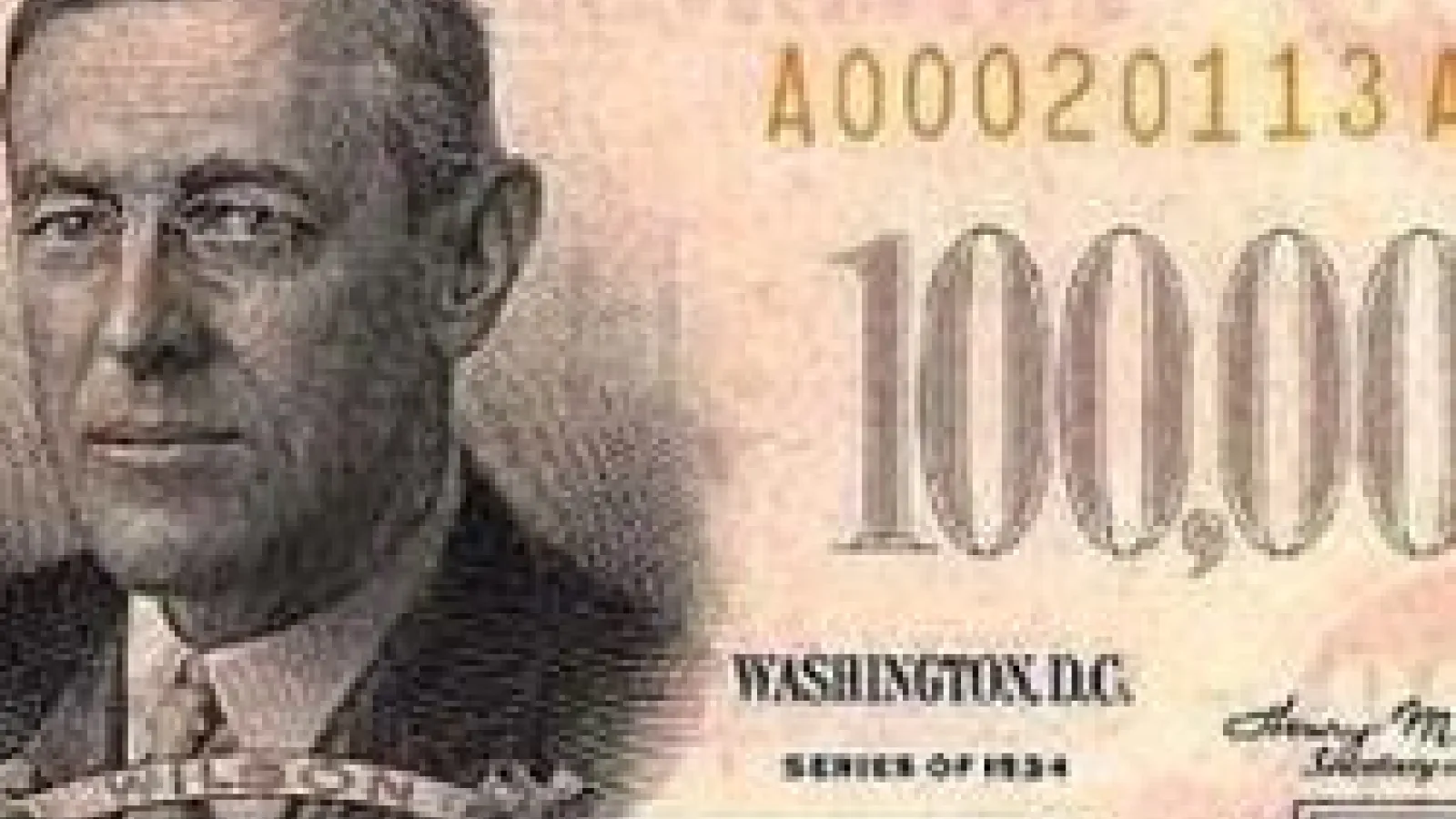 A 100,000 dollar bill with the face of Woodrow Wilson