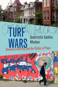 Cover with images of graffiti and row-style homes