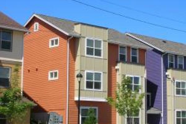 an apartment building with rows of windows