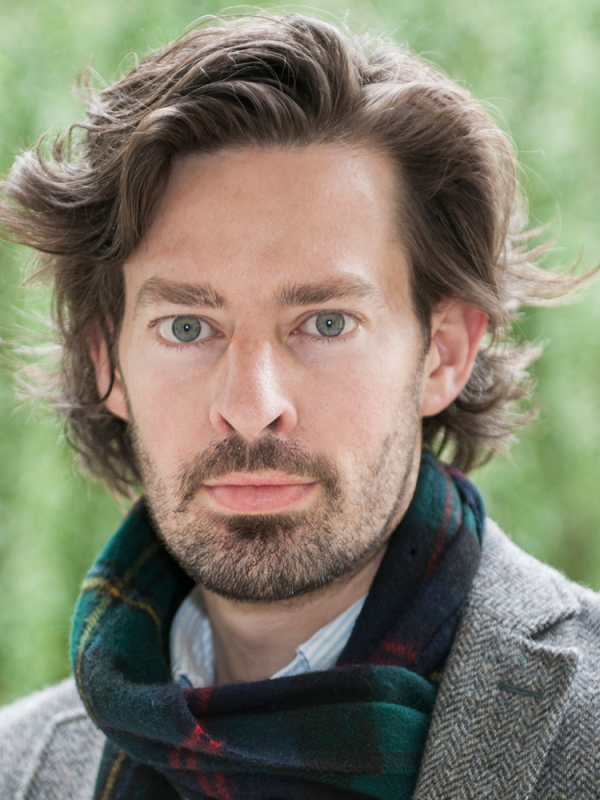 headshot portrait of man with scarf 