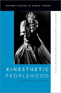 blue cover with a black and white image of a woman dancing
